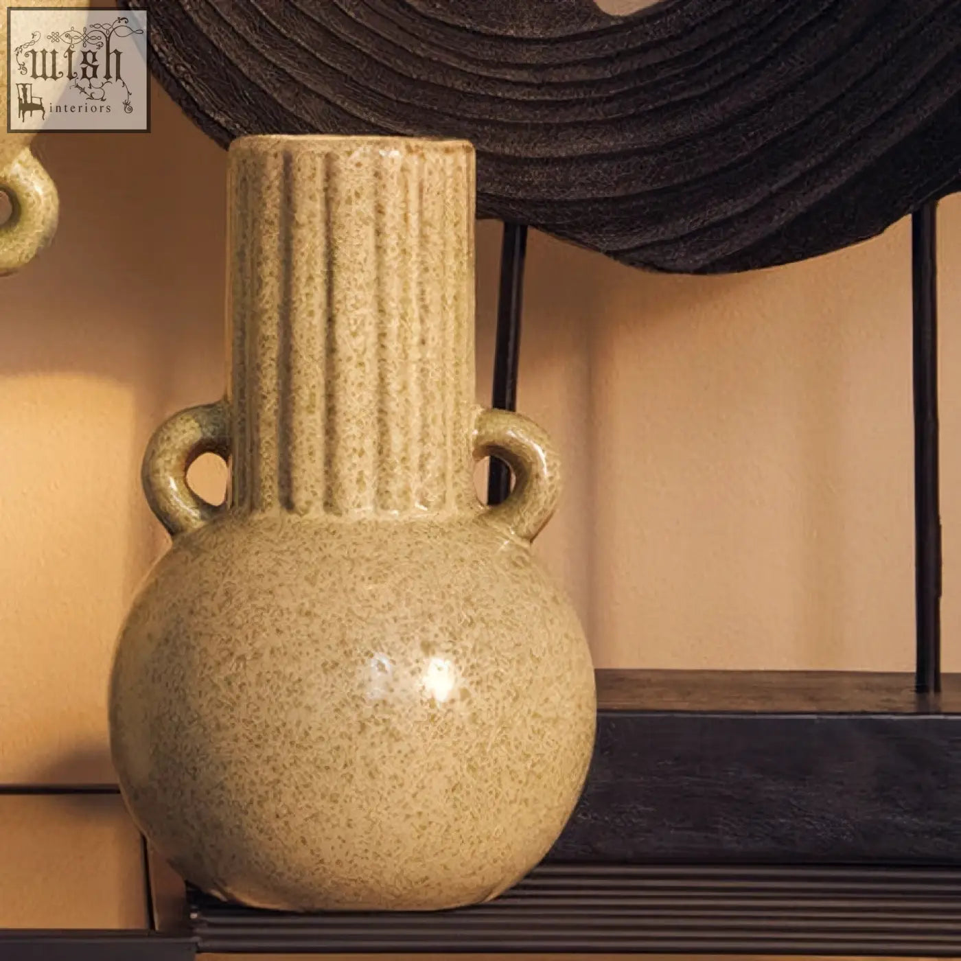 Beige ceramic calcita small speckled green vase with vertical ridges and two looped handles