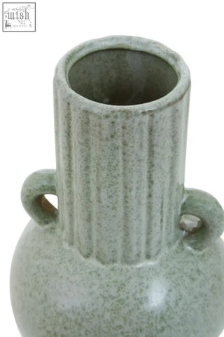 Matte sage green calcita small speckled ceramic vase with vertical ridges and two small looped handles