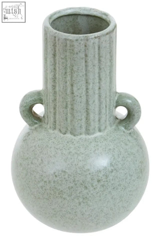 A matte sage green calcita small speckled ceramic vase with vertical ridges and two rounded handles