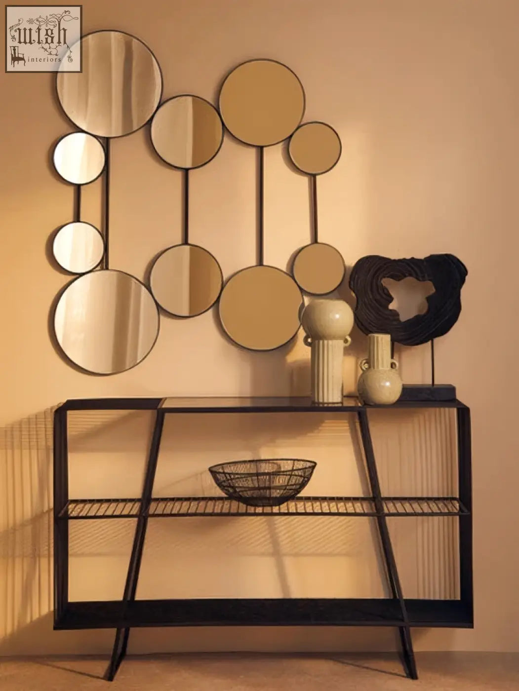 Modern geometric mirror wall art with circular mirrors complements the calcita small speckled green vase decor
