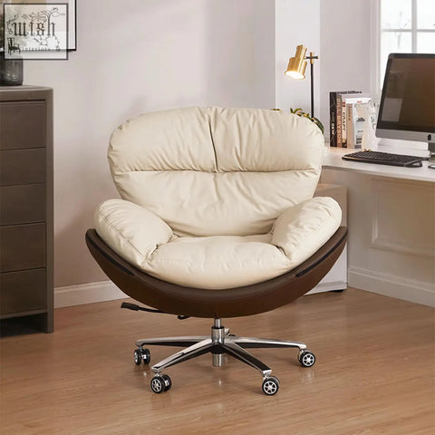 Cream-colored plush leather calder swivel office chair with curved brown base and chrome five-star wheels