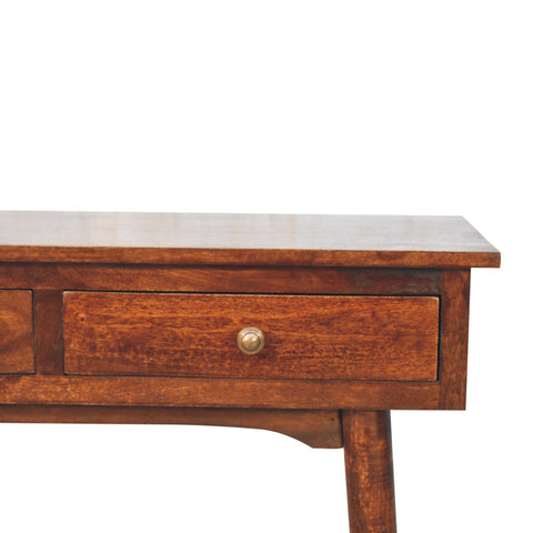 A rustic california walnut hallway console table with warm brown finish and two drawers with brass knobs