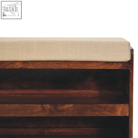 Beige mud linen upholstery on a california walnut wooden pull out shoe bench with dark brown multi tiered shelves