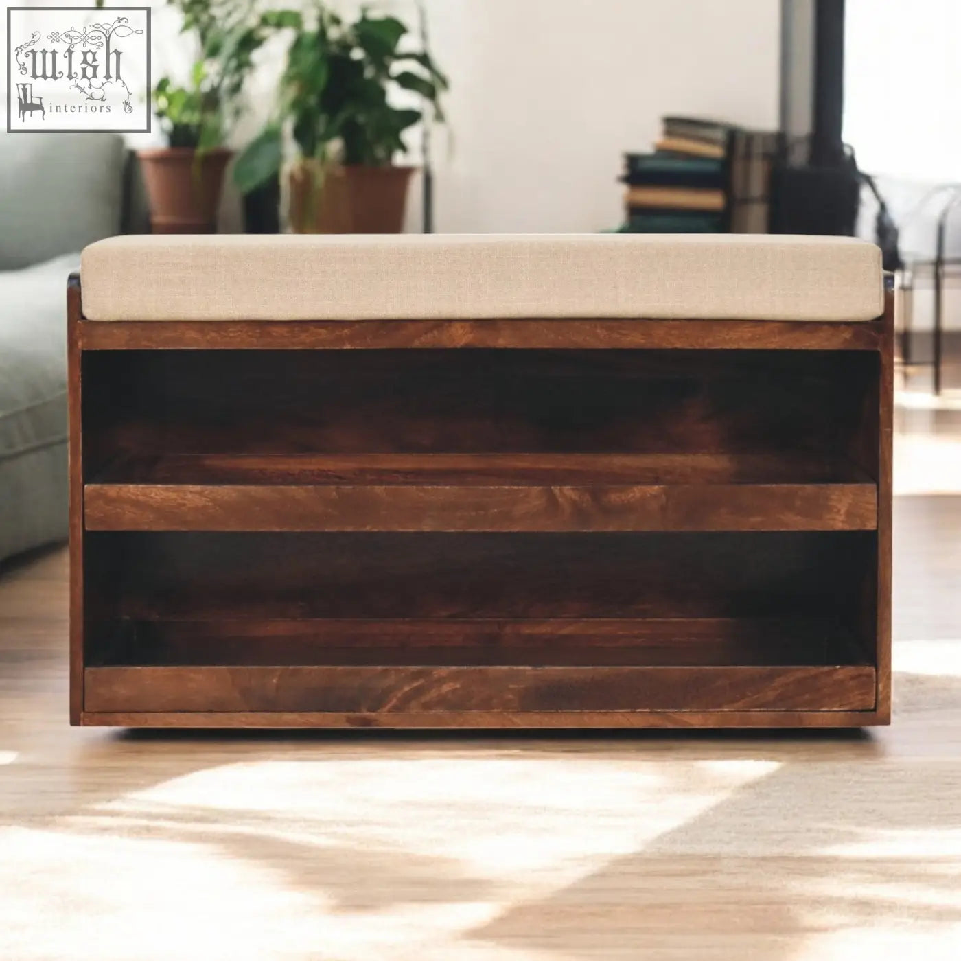 A sleek california walnut shoe rack with mud linen upholstery and three open shelves for shoe storage