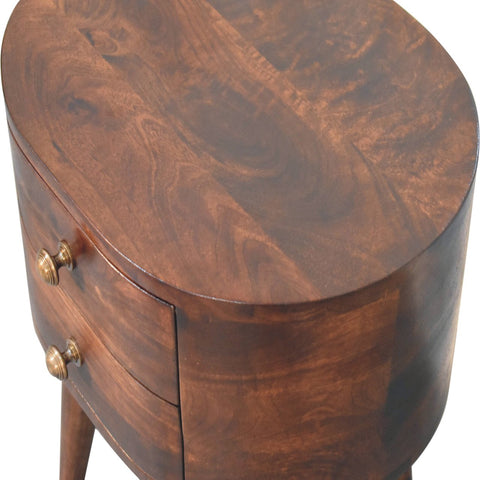 Rich dark brown california walnut rounded bedside table with two drawers and brass knobs in an oval shape