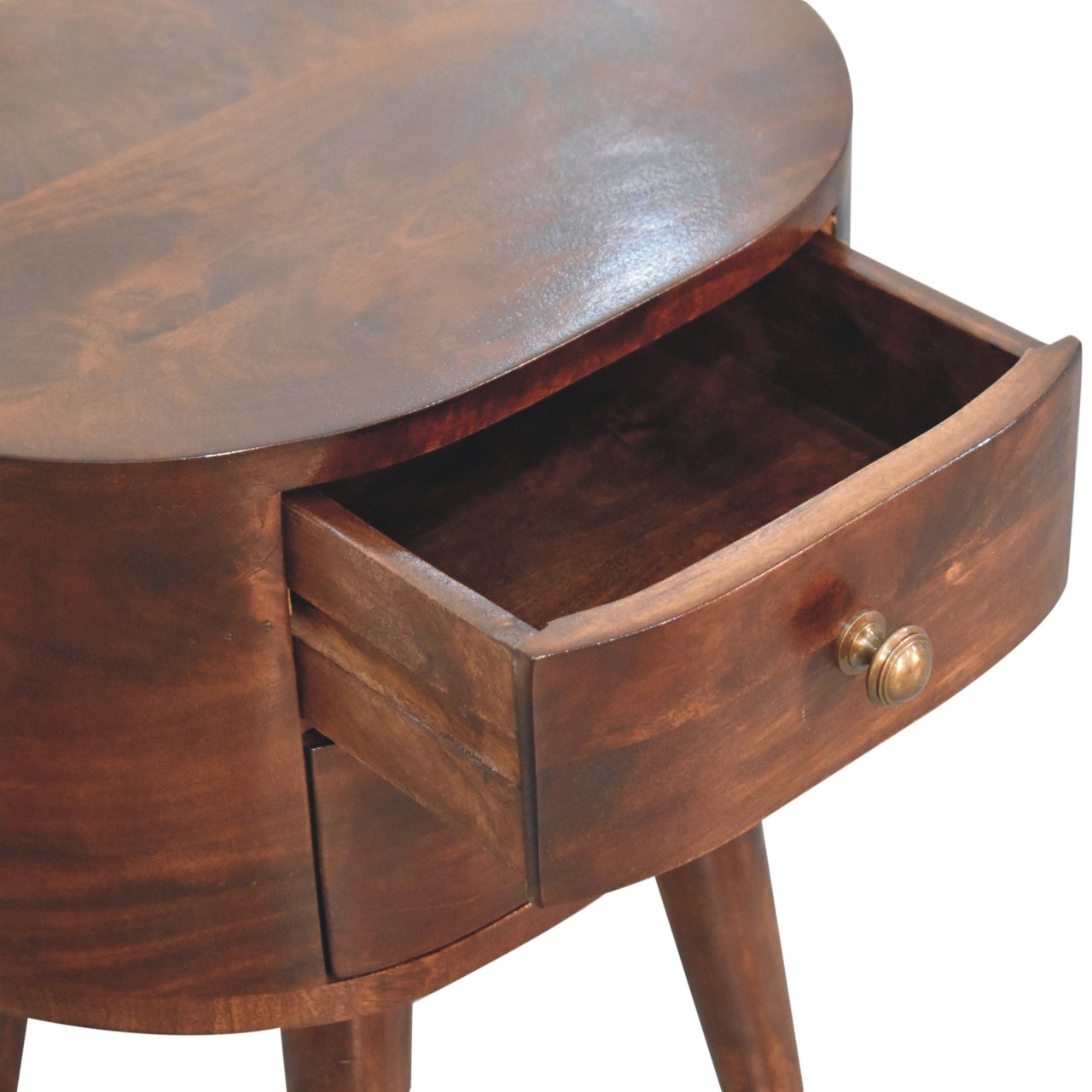 A california walnut rounded bedside table with rich dark brown wood, curved top, and tapered legs