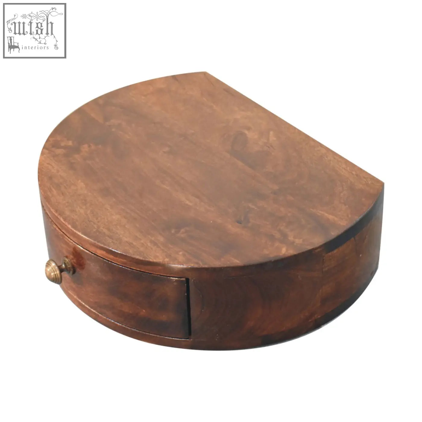 A polished dark brown california walnut wall mounted jewelry box with a curved lid and brass drawer knob