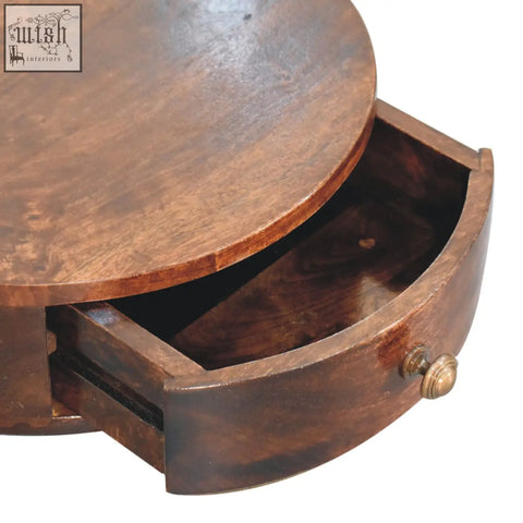 Round wooden california walnut wall mounted bedside table with curved drawer and brass knob in warm finish