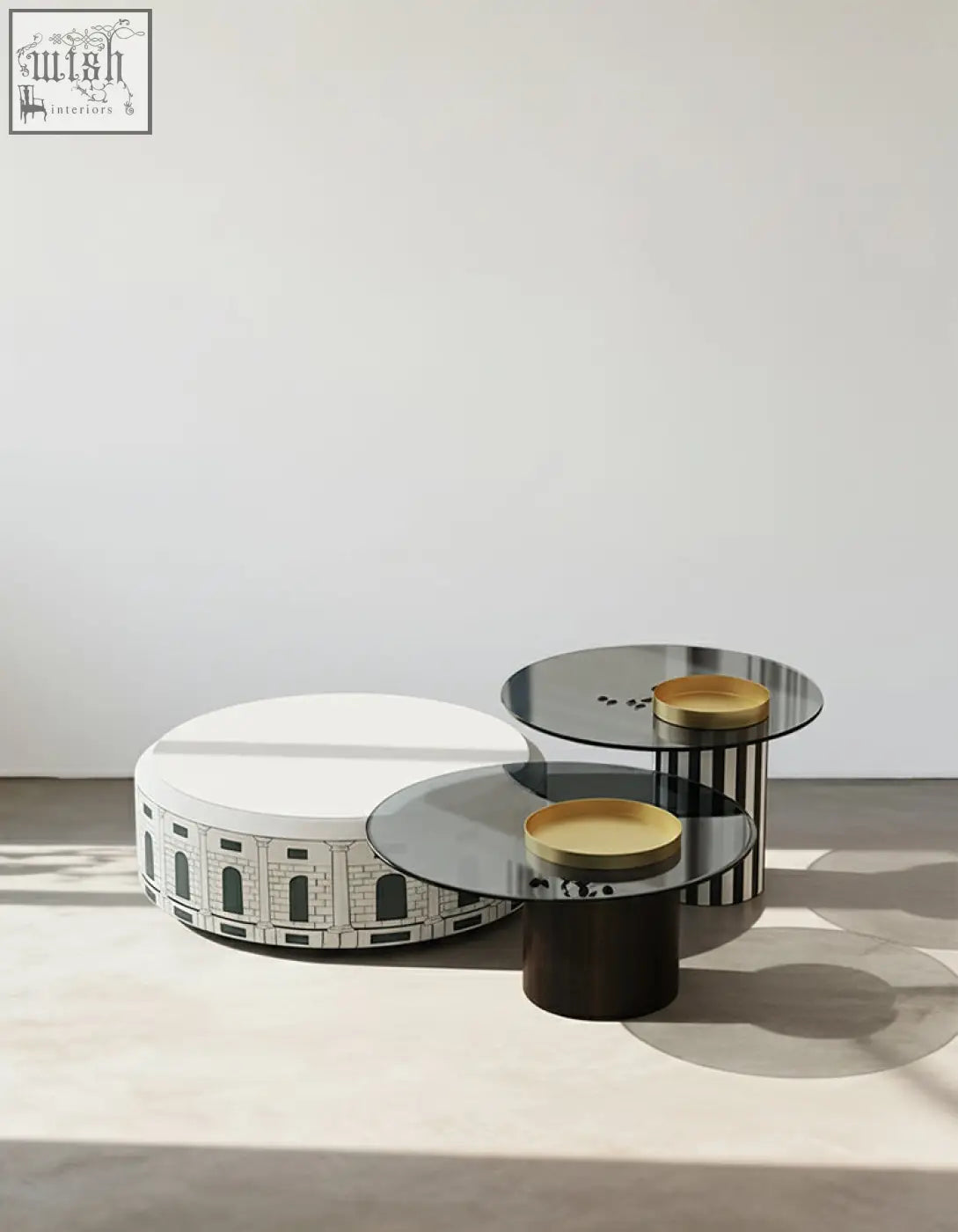 Calloway nesting coffee table set with circular glass tops black and white striped bases and gold trays