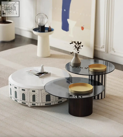White nesting coffee table with black architectural line art design part of calloway nesting coffee table set