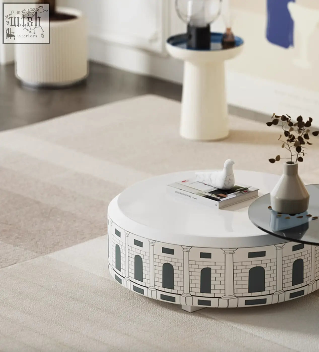 White round nesting coffee table with black architectural amphitheater design in calloway nesting coffee table set