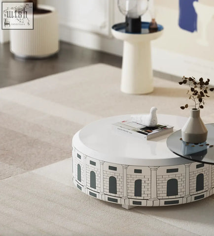 White round nesting coffee table with black architectural amphitheater design in calloway nesting coffee table set