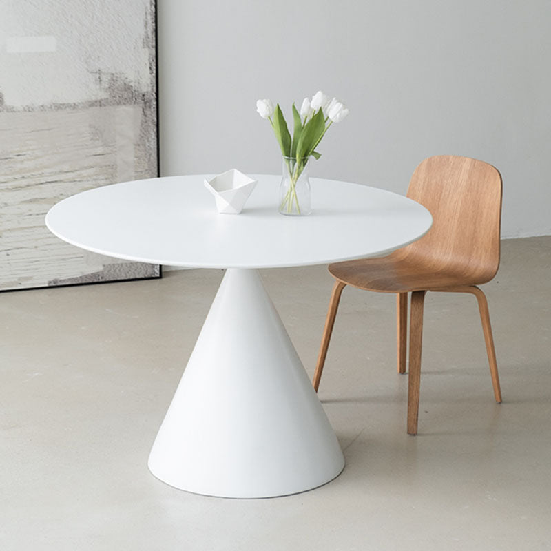 White calvin cone round dining table with a conical base perfect for modern dining spaces