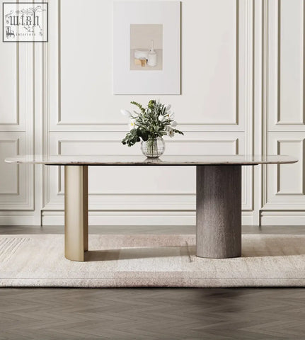Modern cameron marble dining table with oval polished marble top and contrasting gold and gray stone legs