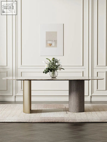 Modern cameron marble dining table with sleek white marble top and contrasting gold and gray stone legs