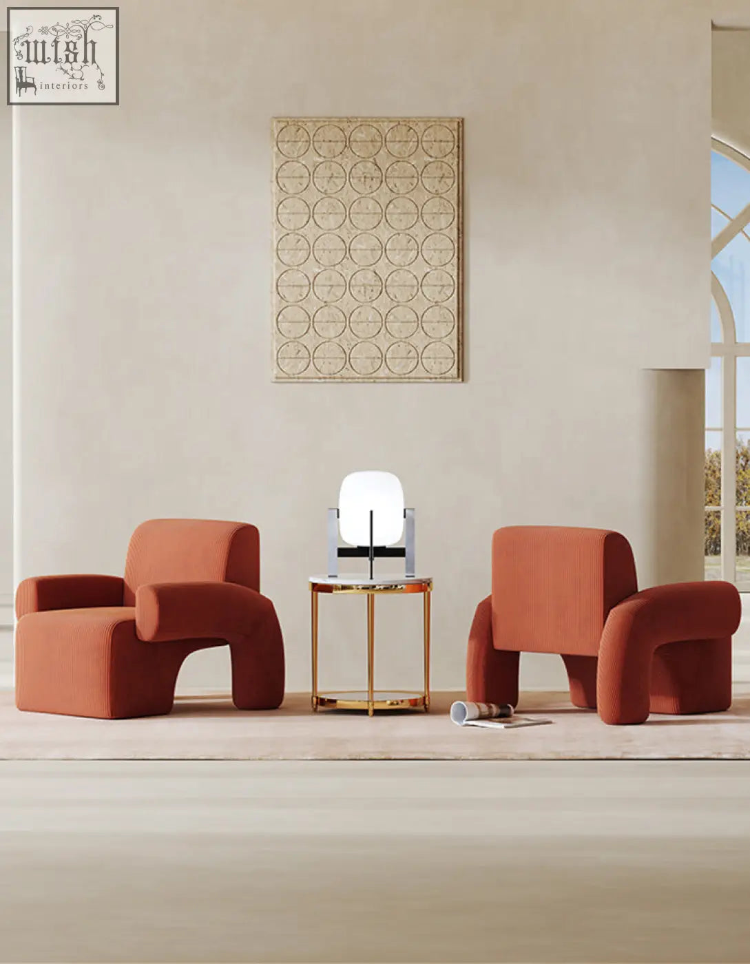 Modern orange upholstered camilla armchair with deep seat and sculpted ergonomic form perfect for comfort and style