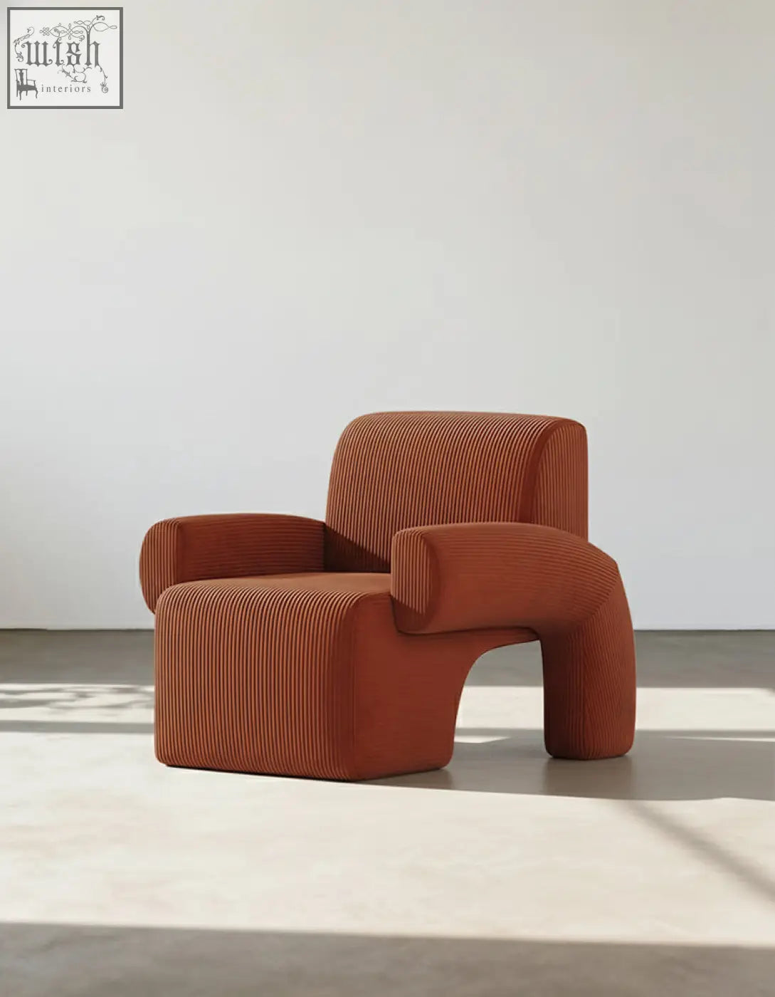 Camilla armchair in terracotta corduroy features a sculptural curved design with offer financing and low shipping cost options