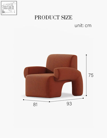 Camilla armchair in rust corduroy with a sculptural curved design offering financing and low shipping cost options