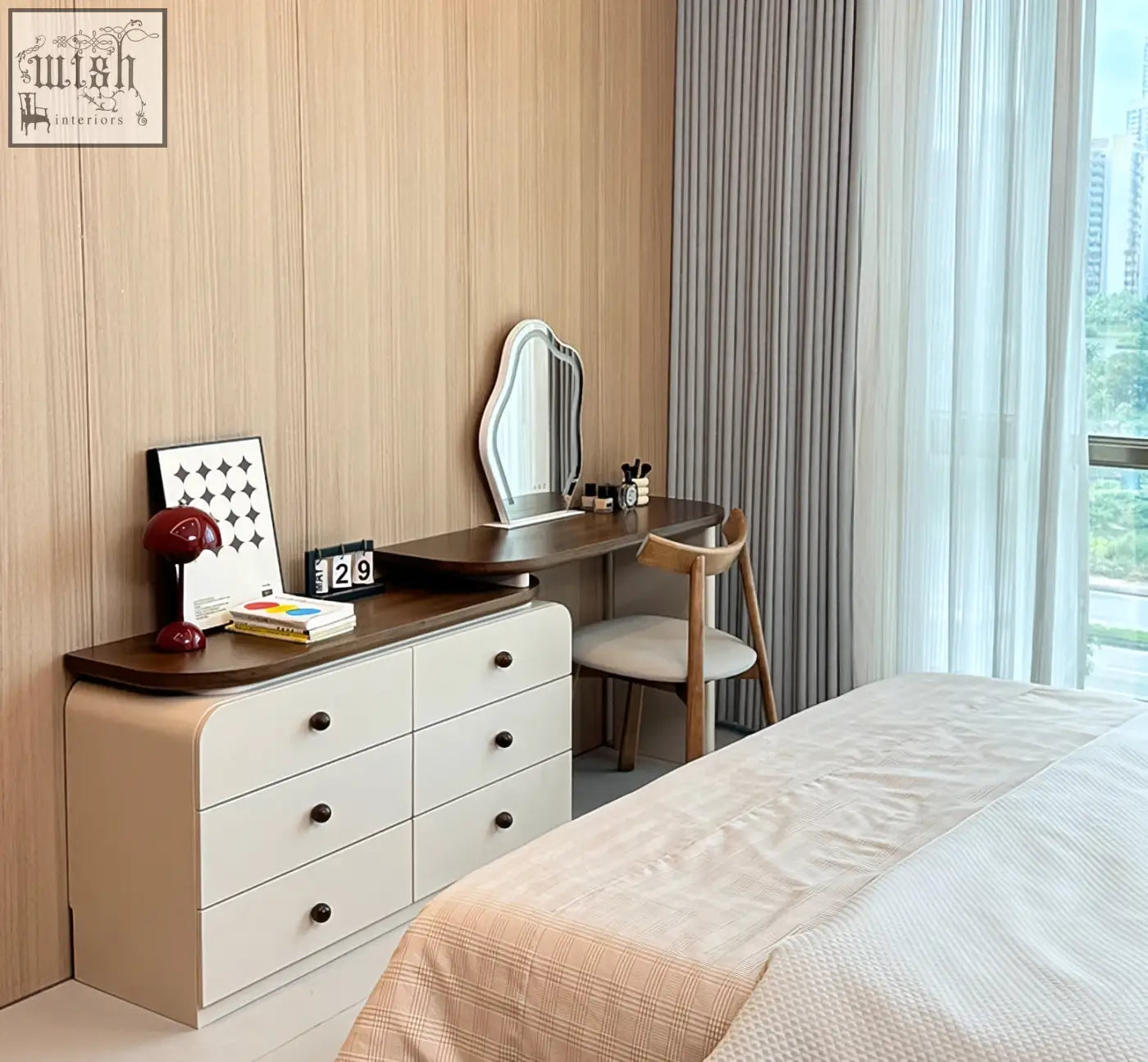 Beige wooden dressing table with dark wood top and black round knobs in campbell dressing table set