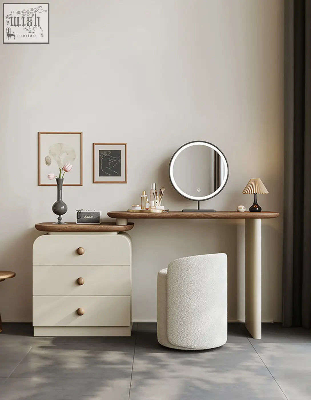 Round illuminated vanity mirror with sleek silver frame on campbell wooden dressing table with chest of drawers