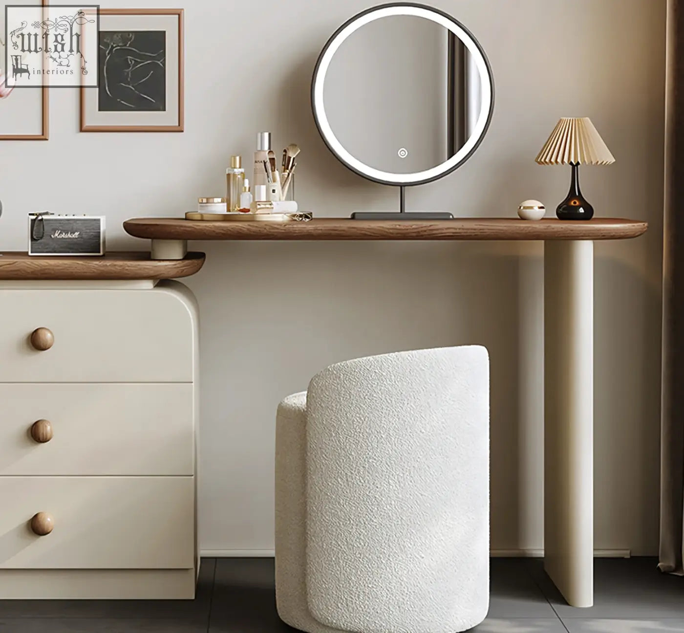 Round led vanity mirror with black frame and illuminated edge on a wooden dressing table from campbell series