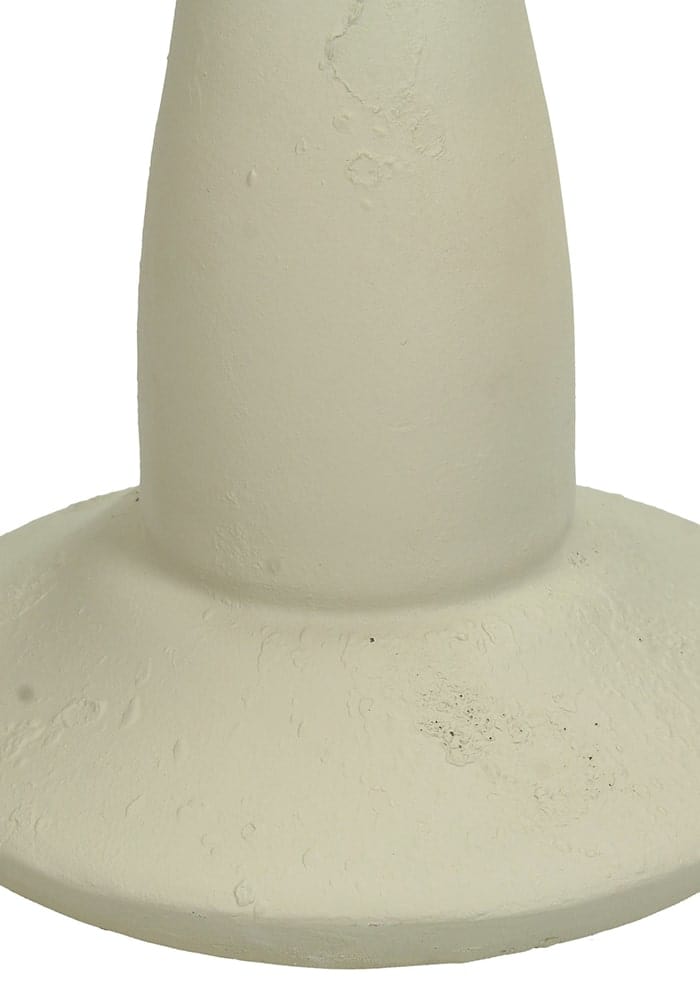 Off-white candle stick ivory with textured concrete pedestal base and tapered cylindrical shaft