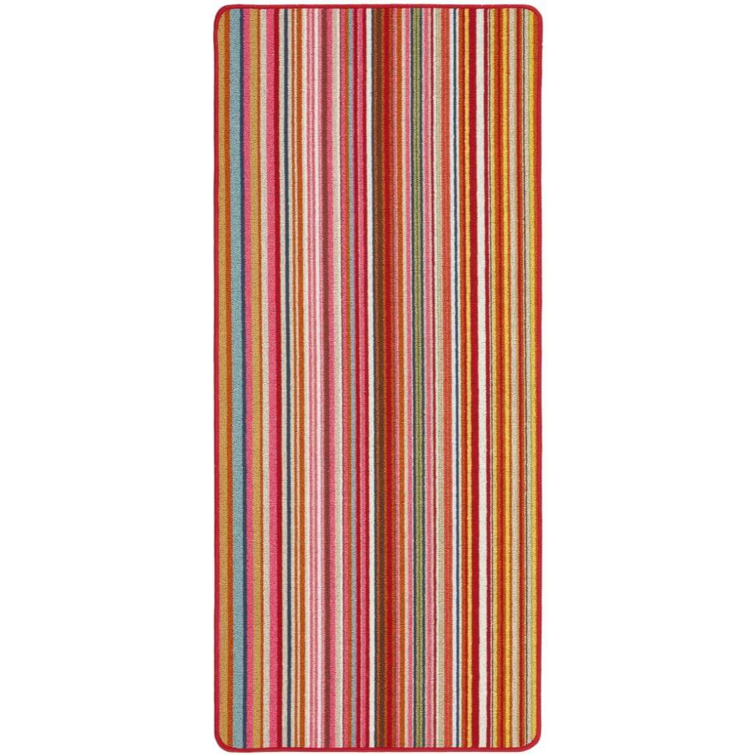 A candy washable runner rug with vertical warm red orange pink and beige stripes and a solid reddish brown border