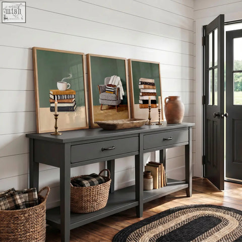 Dark gray console table with two drawers rustic design and black metal handles below canvas 3 piece wall art set