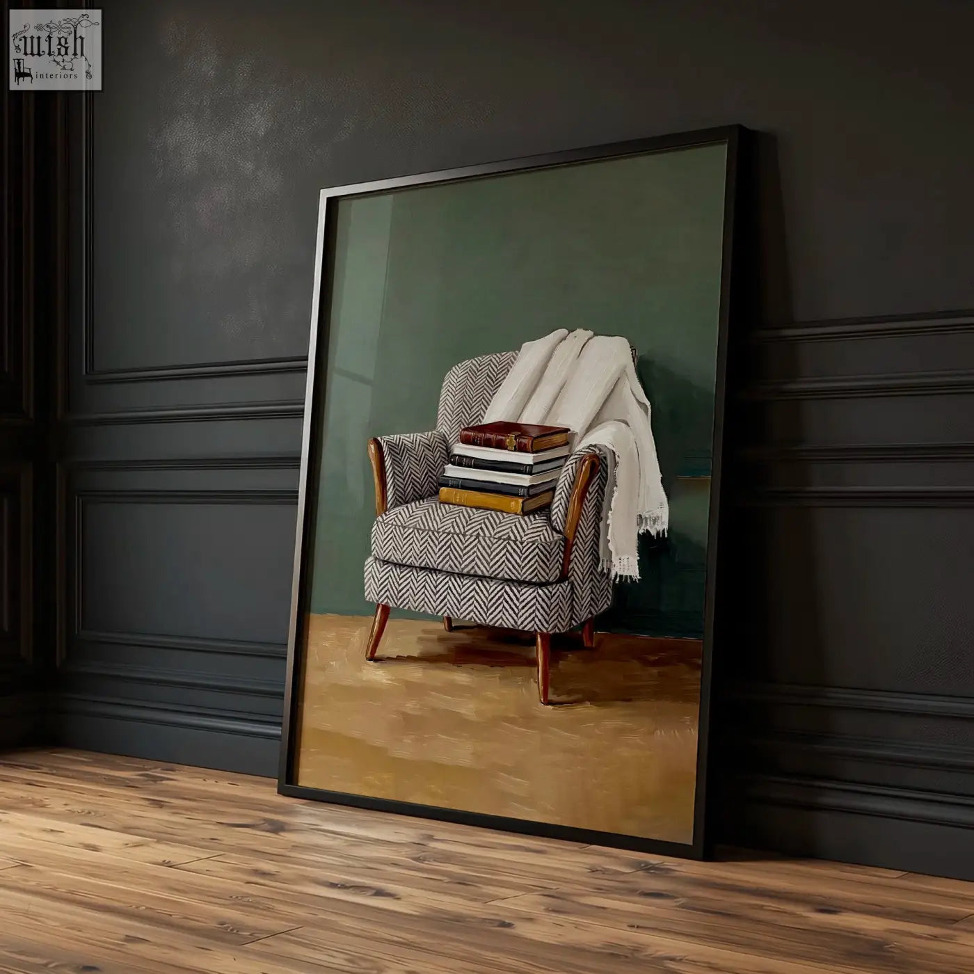 A framed piece wall art showing a classic armchair in black and white herringbone with wooden arms and books on top