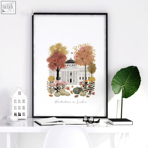 A framed canvas print of a white covent garden building with autumn trees and pumpkins travel wall art for london hallway