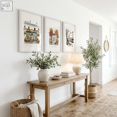 A white ceramic vase with eucalyptus branches as part of london travel wall art prints covent garden set of 3