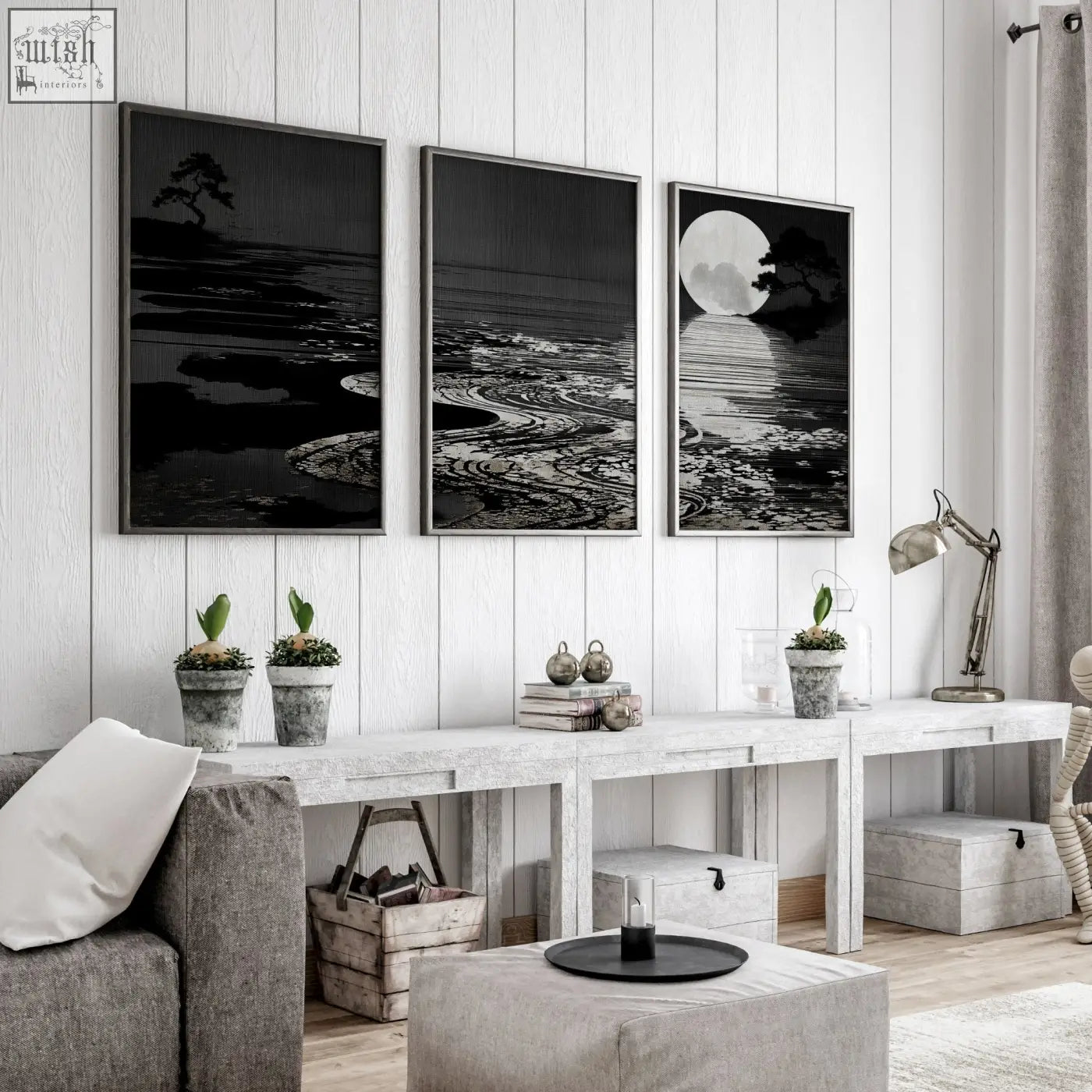 Three black and white canvas pictures with deep charcoal frames show serene coastal scenes for living room décor