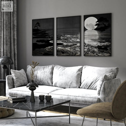 Gray velvet sofa with plush cushions and deep charcoal canvas pictures for living room japandi moon landscape set of 3