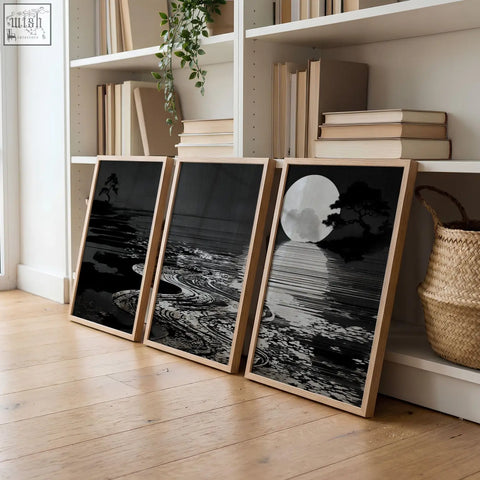 Three black and white canvas pictures with deep charcoal japandi moon landscape in minimalist wooden frames for living room
