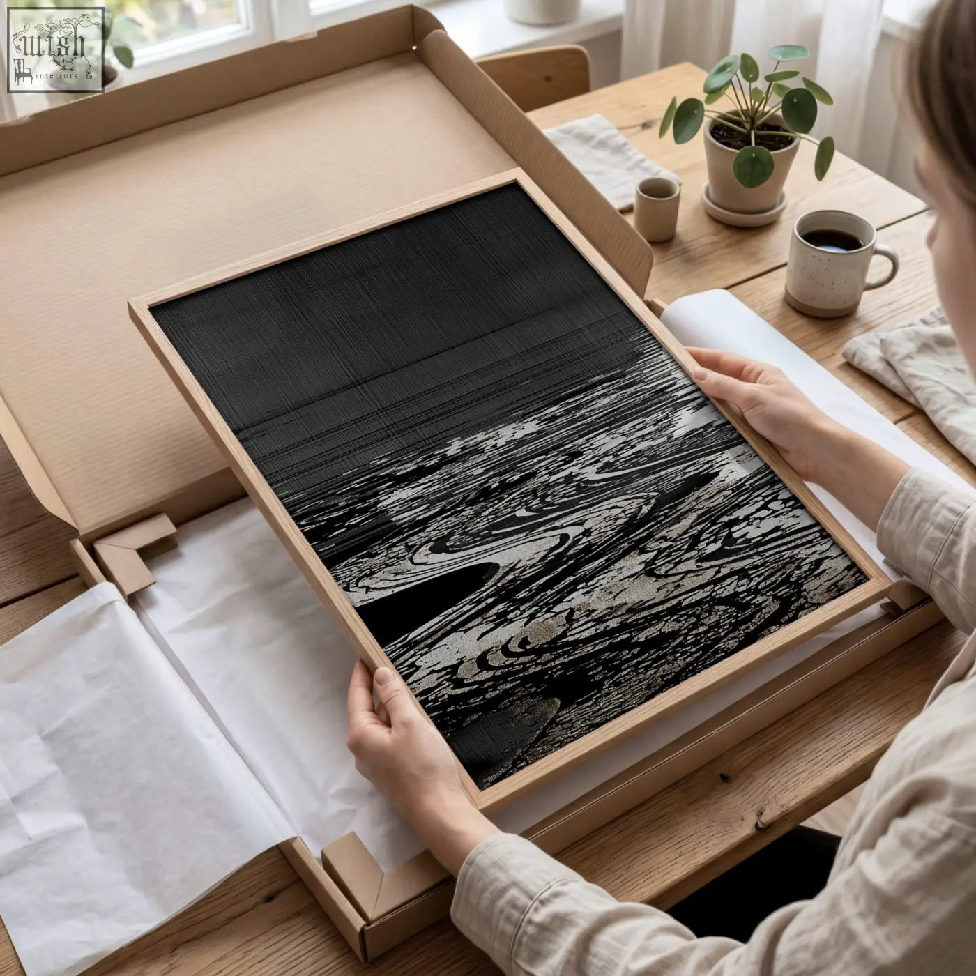 Minimalist black and white canvas picture with deep charcoal tones in a light wood frame for living room wall decor