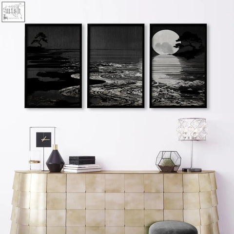 Three black-framed canvas pictures with deep charcoal moonlit coastal scenes perfect for living room decor