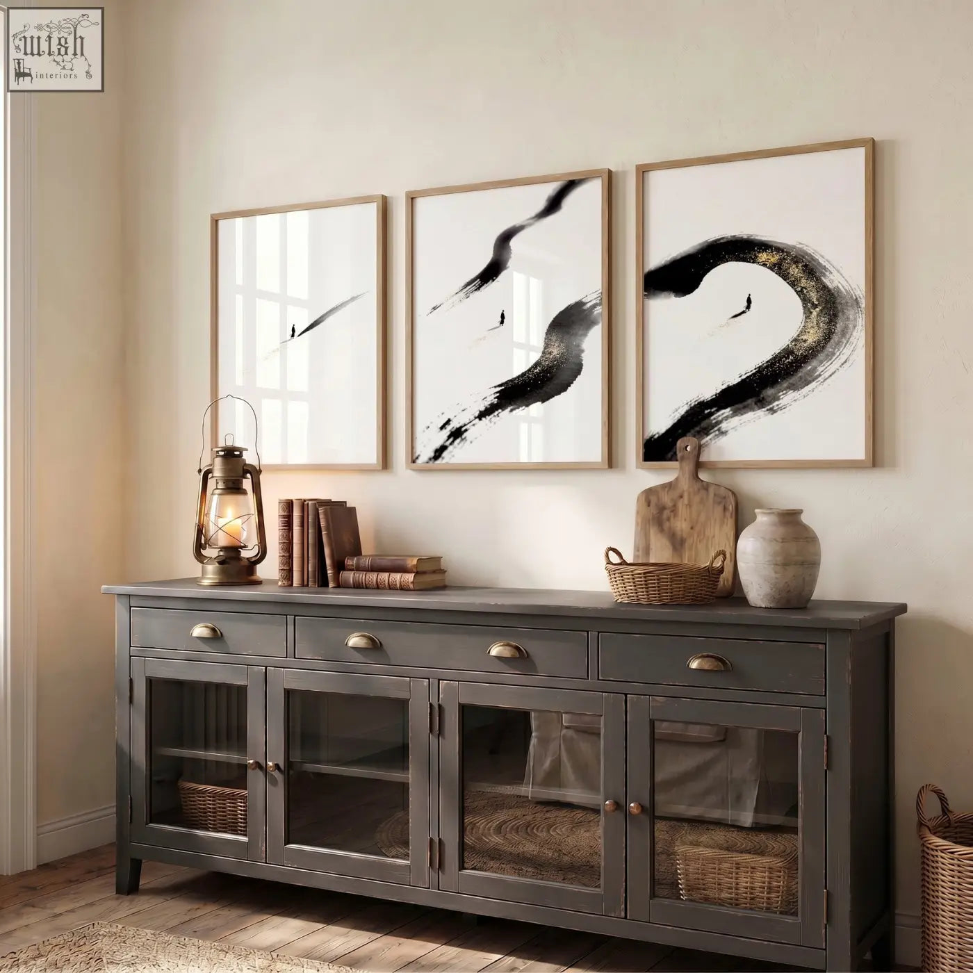 Dark gray wooden sideboard with glass paneled doors and brass handles below canvas zen wall art black ink brushstroke prints
