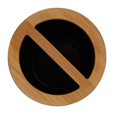 Circular wooden coaster with black interior and diagonal cutout for canyon black toothbrush holder accessory