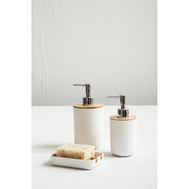 White ceramic soap dispenser with bamboo lid and chrome pump paired with canyon white soap dish