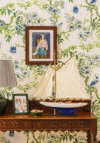 Detailed cape cod twin masted schooner model sailboat with cream sails and blue hull on wooden stand