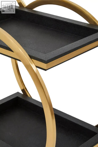 Cardoba two tier black faux shagreen serving trolley with gold-toned frame curved handles and textured tray surface