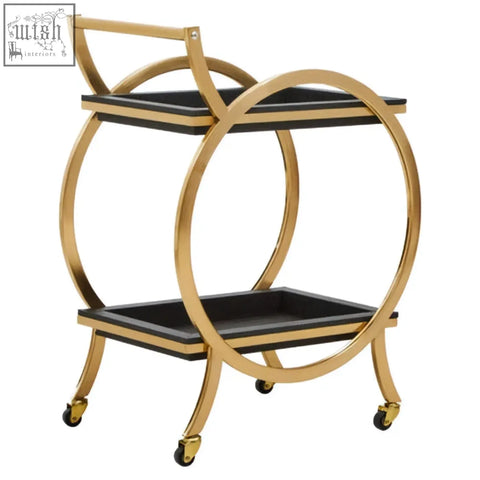 Gold finished circular serving trolley with two tier black faux shagreen glass shelves and caster wheels