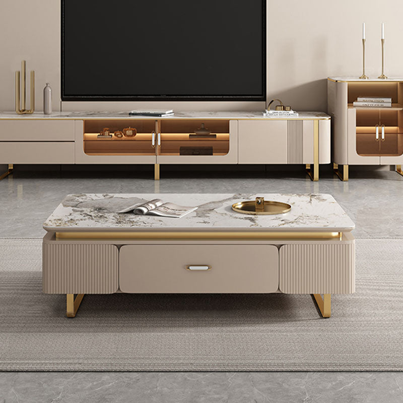 Beige marble top carl rectangle coffee table with gold legs and ribbed accents from carl living room set