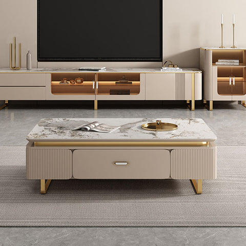 Beige marble top carl rectangle coffee table with gold legs and ribbed accents from carl living room set