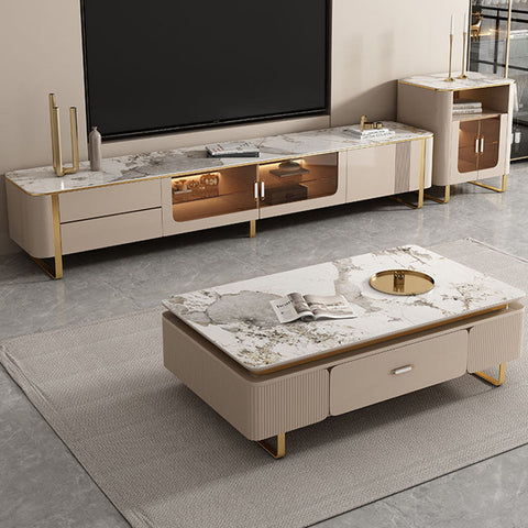 Beige marble-top carl rectangle coffee table with gold legs and drawers in a modern carl living room set design