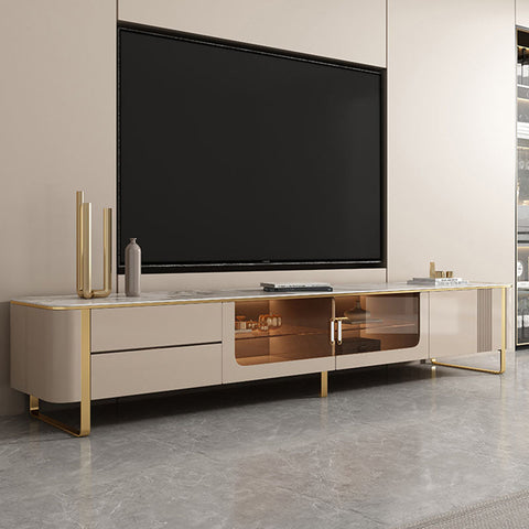 Modern beige tv console with gold accents and glass doors from the carl living room set with carl rectangle coffee table