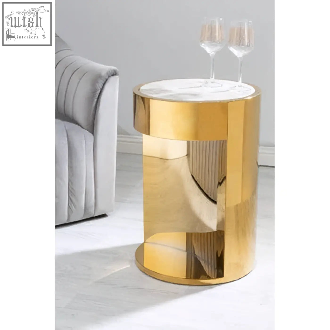 Gold cylindrical side table with white marble effect round top from Carlox perfect for stylish living spaces