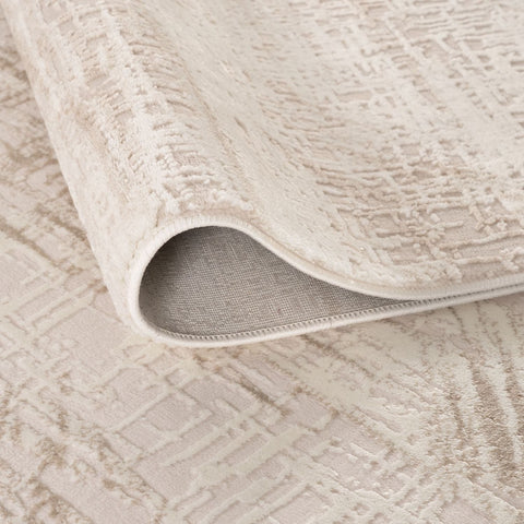 Beige textured carmel cream-beige abstract rug with subtle geometric pattern and soft plush pile