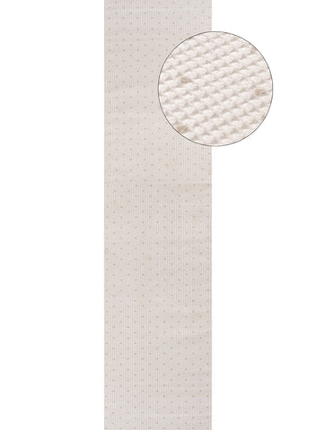 A cream beige dots rug runner with a subtle dotted pattern and textured woven surface perfect for home decor