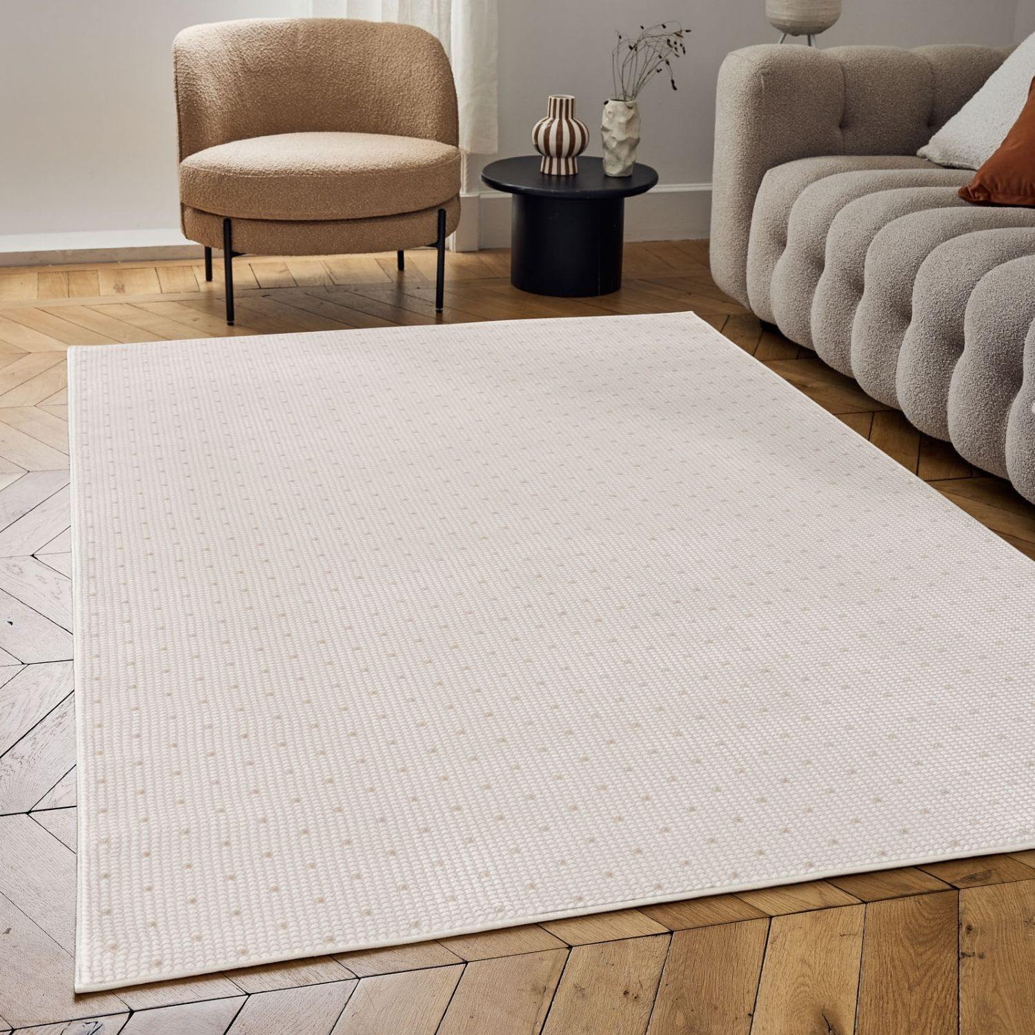 Cream beige dots rug with subtle textured pattern perfect for cozy living spaces or bedrooms